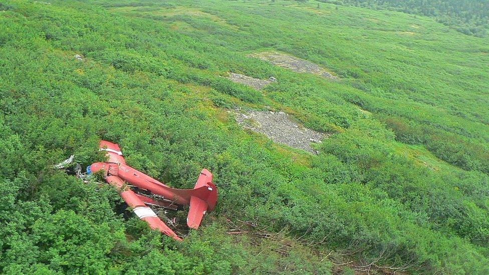 The wreckage of the plane on an Alaskan mountainside