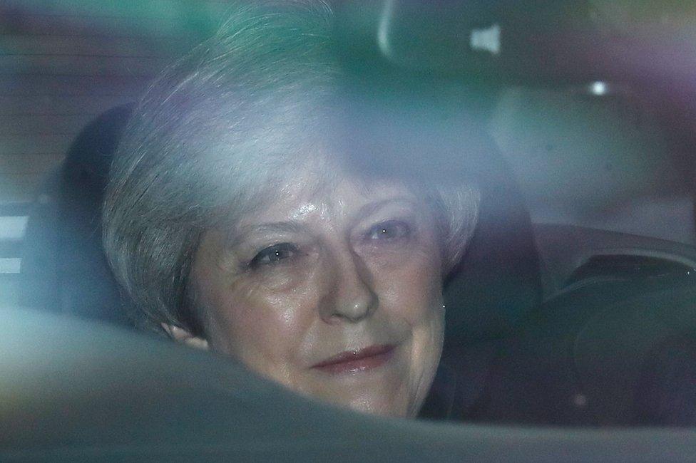 Theresa May in a car