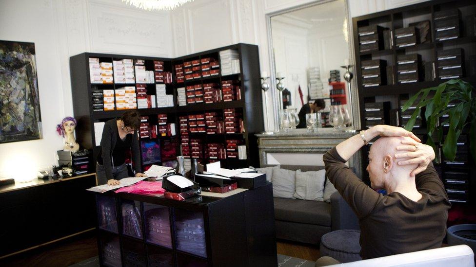 Woman with alopecia in a hair salon