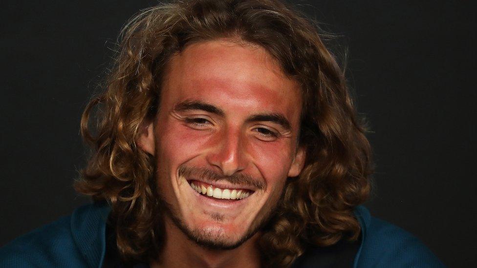 Stefanos Tsitsipas of Greece smiles during a press conference