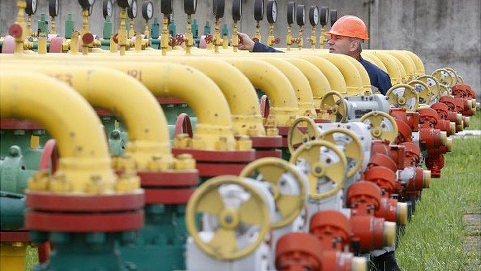 An employee checks equipment at the Dashava underground gas storage facility near Striy, outside Lviv