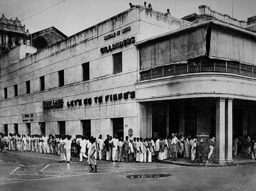 1946: A food queue in Calcutta, after four days of rioting and looting.