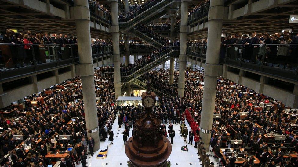 Lloyd's of London staff observe the silence on 11 November 2015