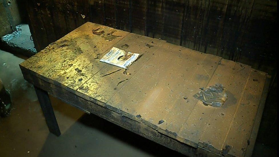 Wooden table found in bunker