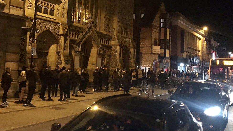 queue of drinkers in Cambridge