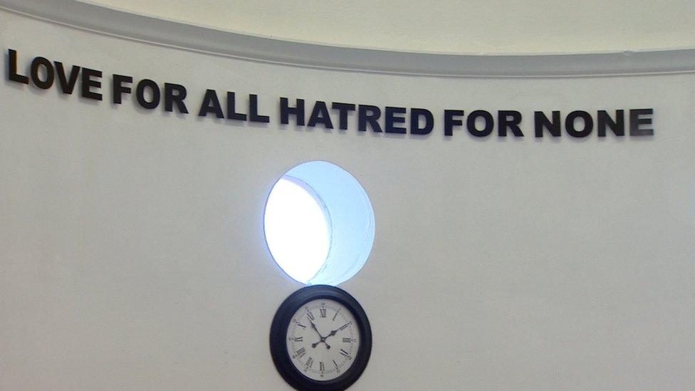 Message on wall in mosque