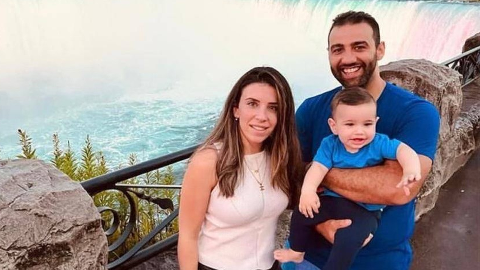 Wafaa Abouyzada, Abood Okal and their son, Yousef