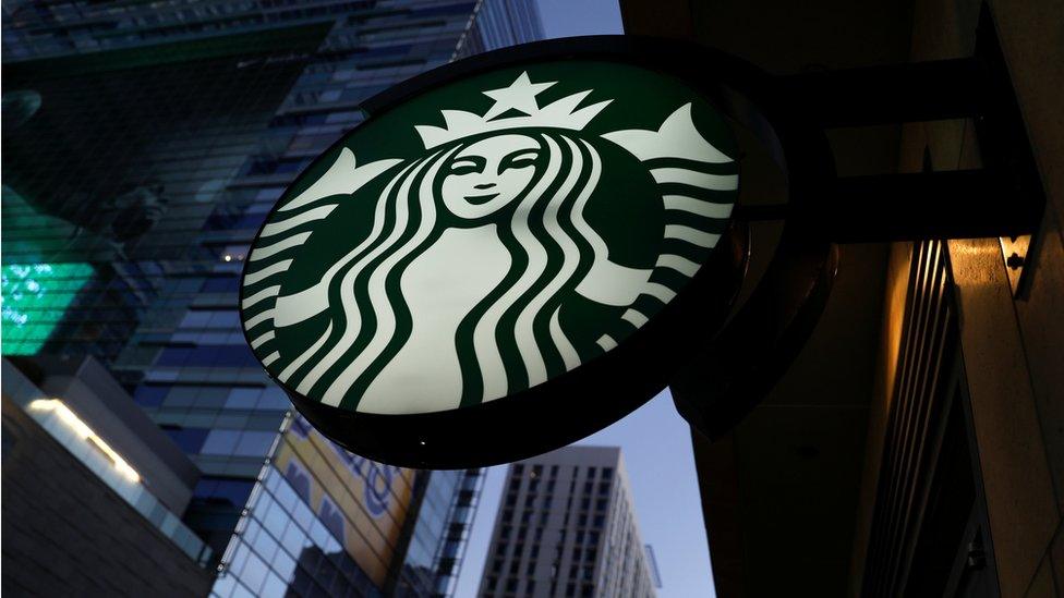 Starbucks sign hanging in Los Angeles, California