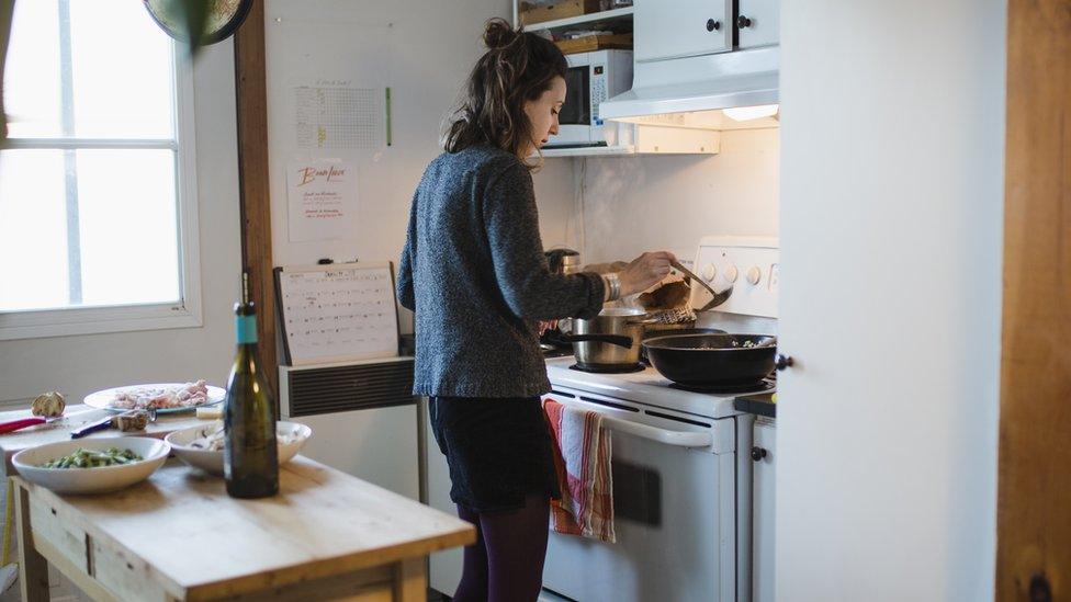 Young woman cooking