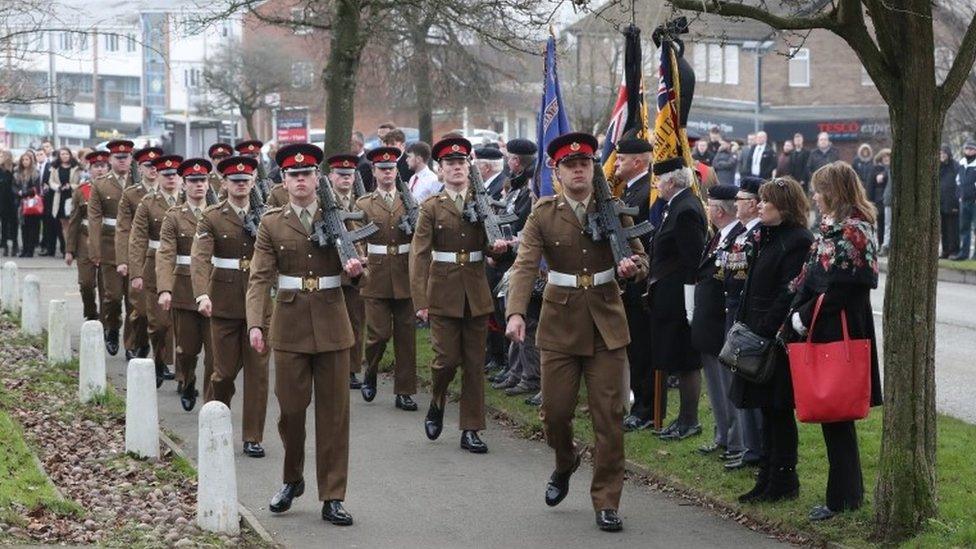 Soldiers arrive to take part in the military funeral of Lance Corporal Scott Hetherington at All Saints and Martyrs Church in Langley, Greater Manchester.