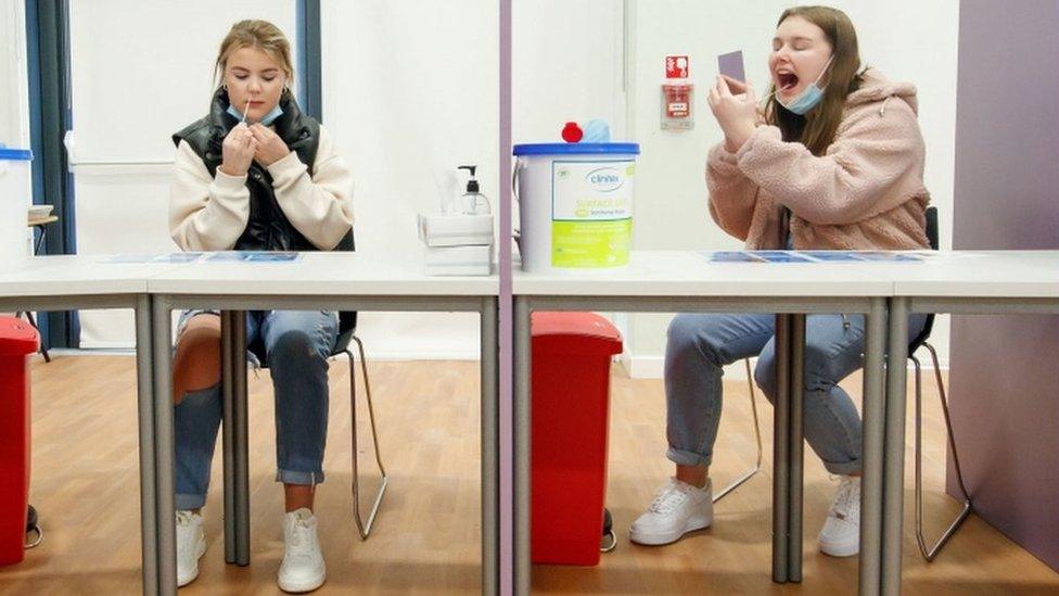 Students Ellie Fisher (left) and Beth Hicks (right) take Coronavirus lateral flow tests at Outwood Academy Adwick in Doncaster, ahead of schools and colleges fully reopening on Monday