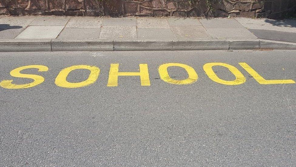 Sohool sign outside school