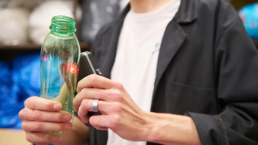 Plastic scanner on a bottle