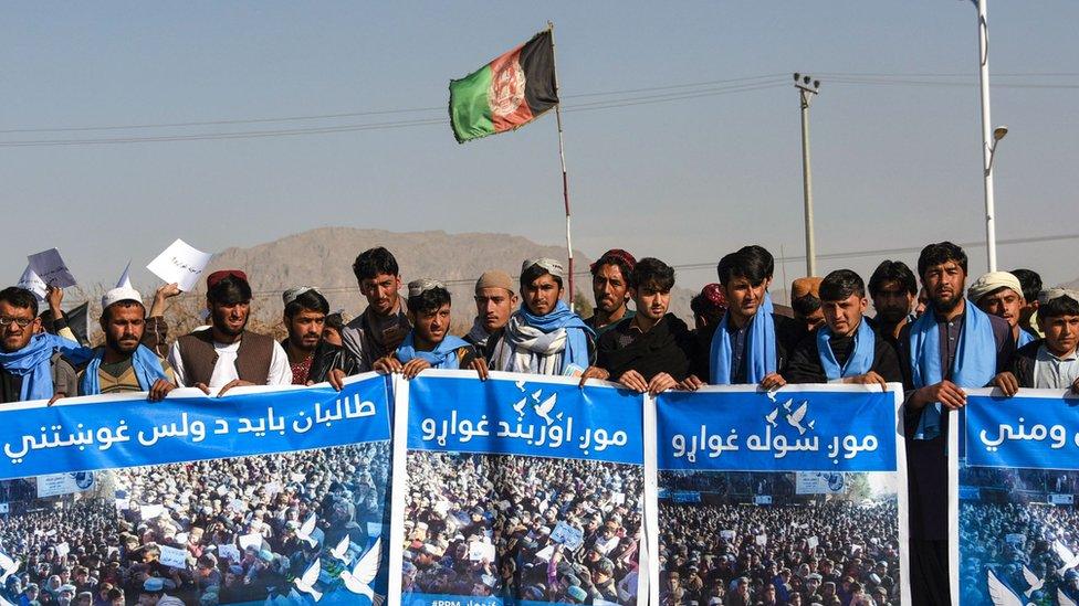 Afghan protesters march for peace and ceasefire in Kandahar province on 17 January 2019