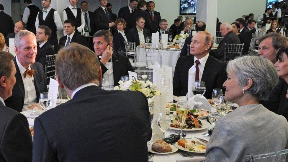 Michael Flynn (centre-left) sits next Russian President Vladimir Putin (centre-right) at a banquet in Moscow. Photo: 10 December 2015