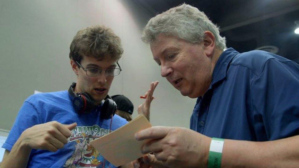 Robert discusses a tournament with his father Maurizio