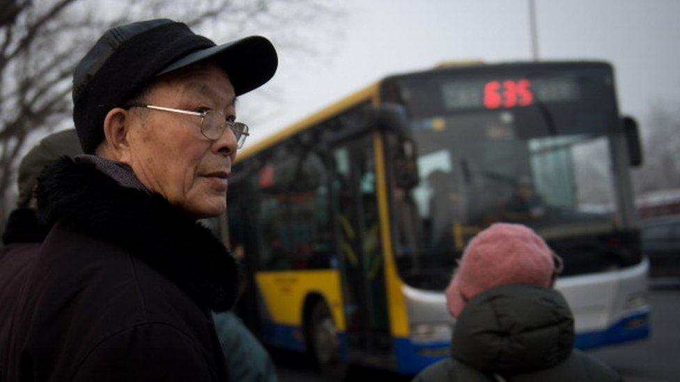 Man waiting for a bus