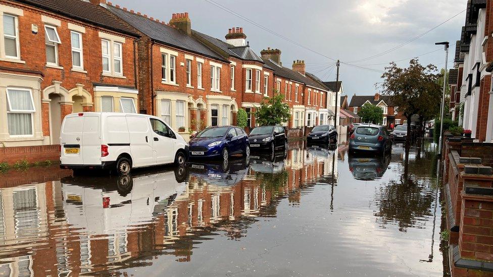 Rain water filling the streets of Denmark Street, Bedford