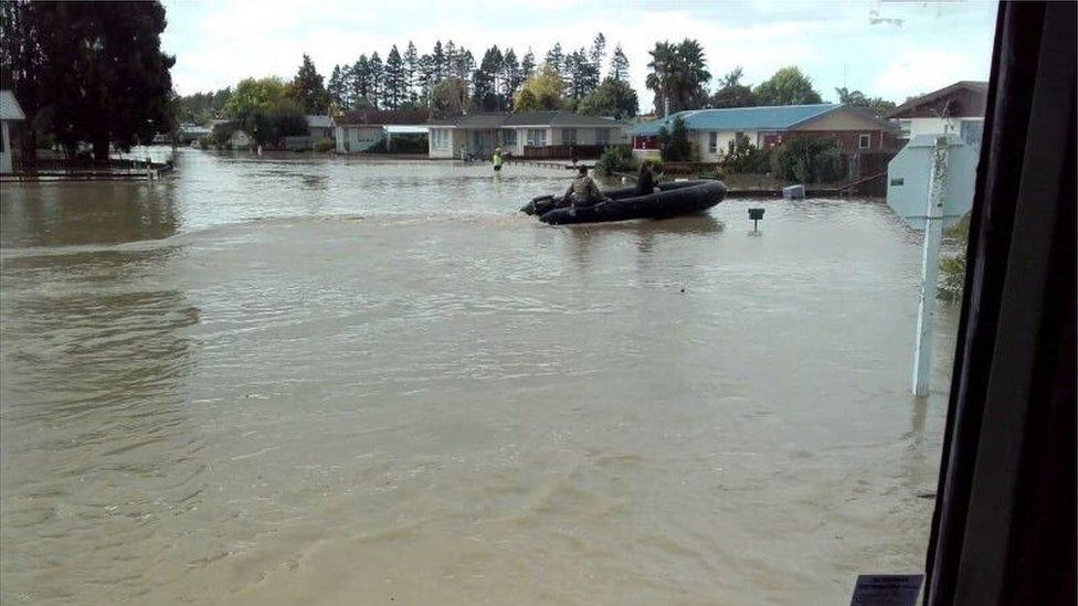 Military inflatable boat evacuating people from Edgecumbe, New Zealand, 6 April 2017.