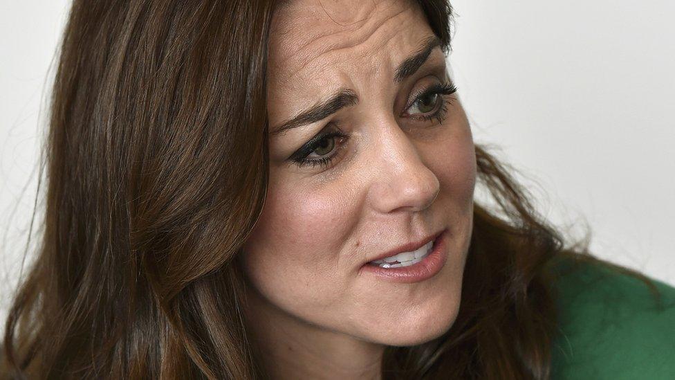 The Duchess of Cambridge listens to a former patient discussing mental health issues