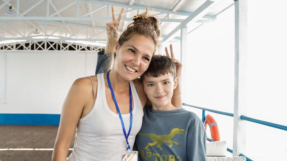 Gulnara Niaz and her son in 2016