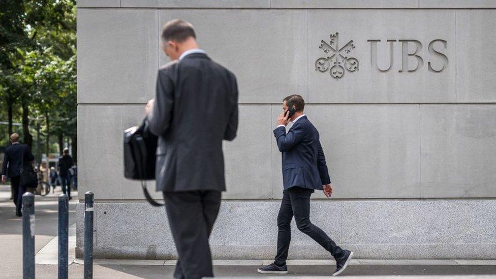 Workers outside UBS in Switzerland