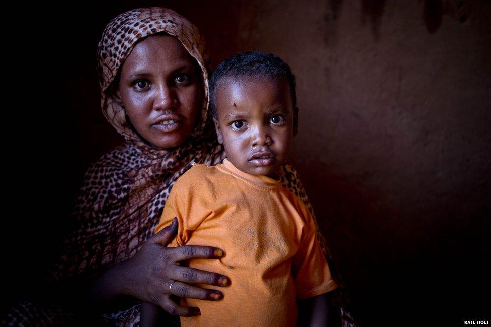 Ghosi, 3, and his mother