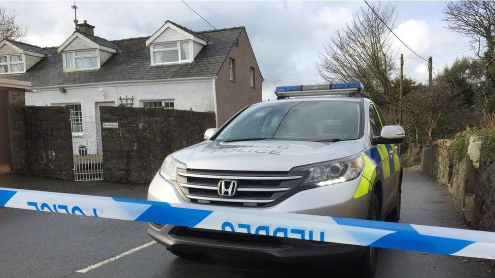 Police are and tape at Llanbedrog