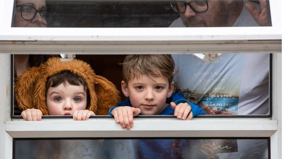 Family at a window