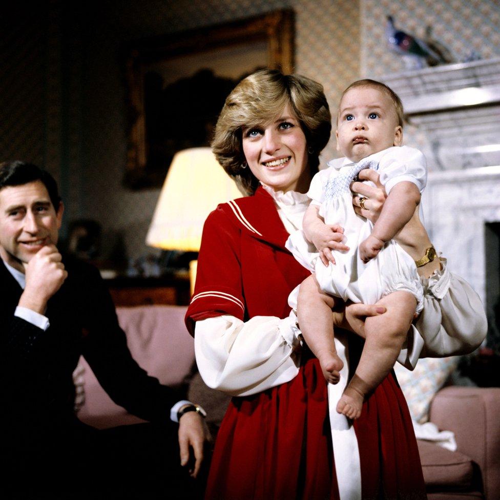 The Prince and Princess of Wales at Kensington Palace with baby son Prince William. 22 December 1982