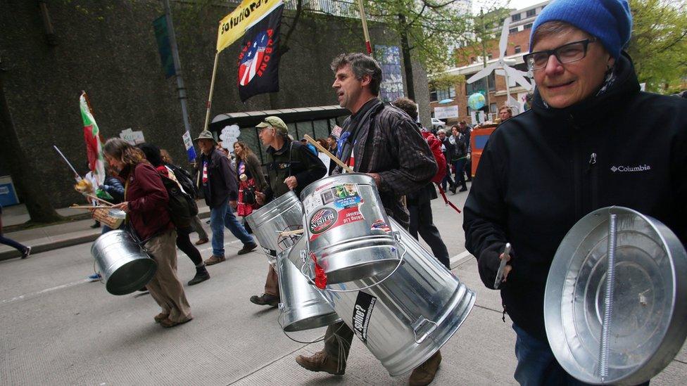 Demonstrators from the Backbone Campaign join the People's Climate March on April 29, 2017 in Seattle, Washington