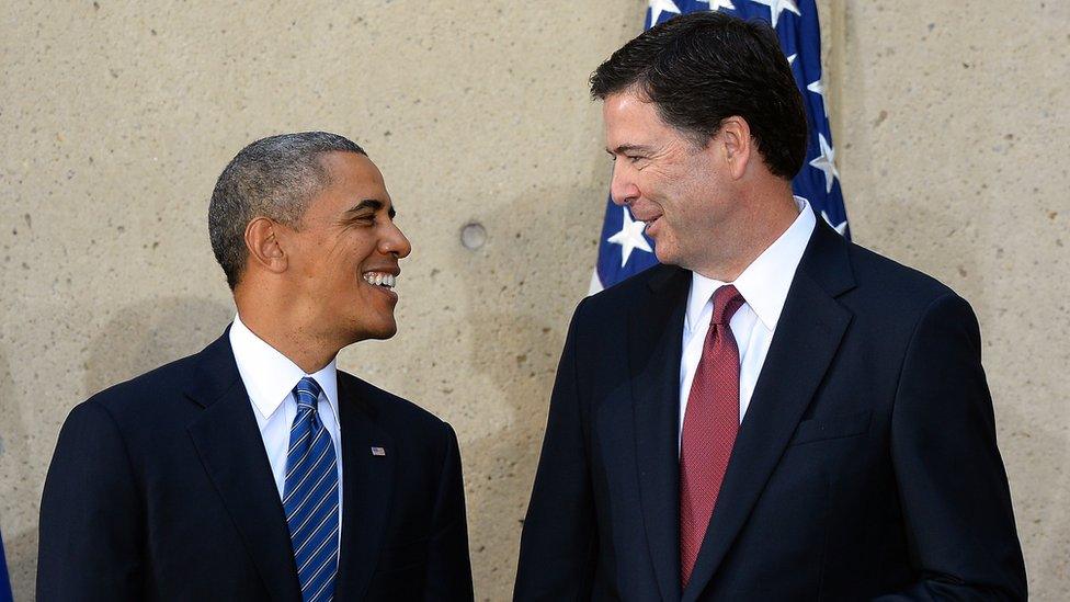 US President Barack Obama (left) talks with FBI Director James Comey during his installation ceremony in Washington, 28 October 2013