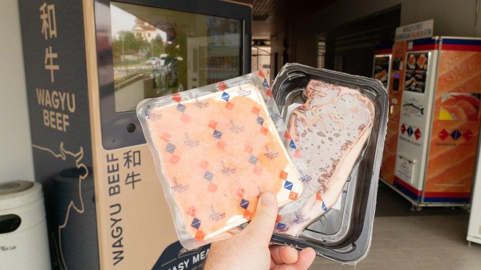 Wagyu beef vending machine and Norwegian Salmon ATM with dispensed products.