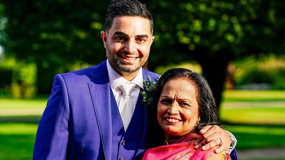 Ankur Desai and his mum outside