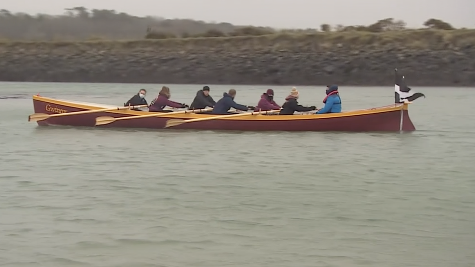 Rowers in the gig on the water