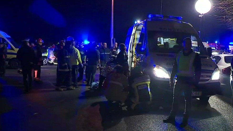 Portuguese emergency services treat some of the injured after the fire in Vila Nova da Rainha