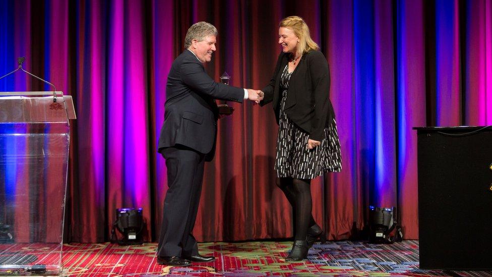 Jessica May being awarded an entrepreneur of the year award