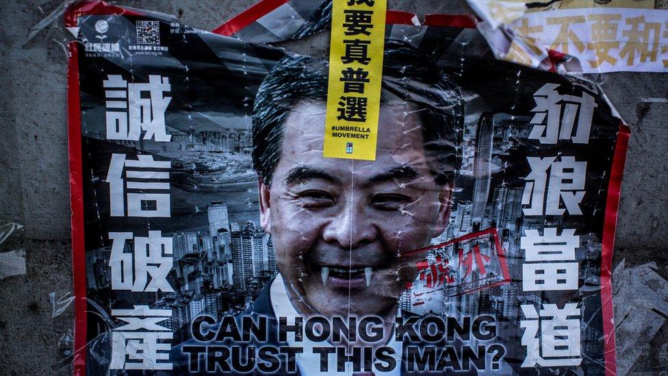 A poster showing Hong Kong's Chief Executive CY Leung is seen on a wall at the Occupy Central protest site in the Admiralty District on October 29, 2014 in Hong Kong