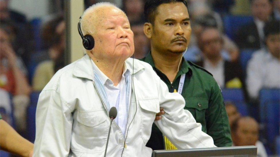 Khieu Samphan stands in court