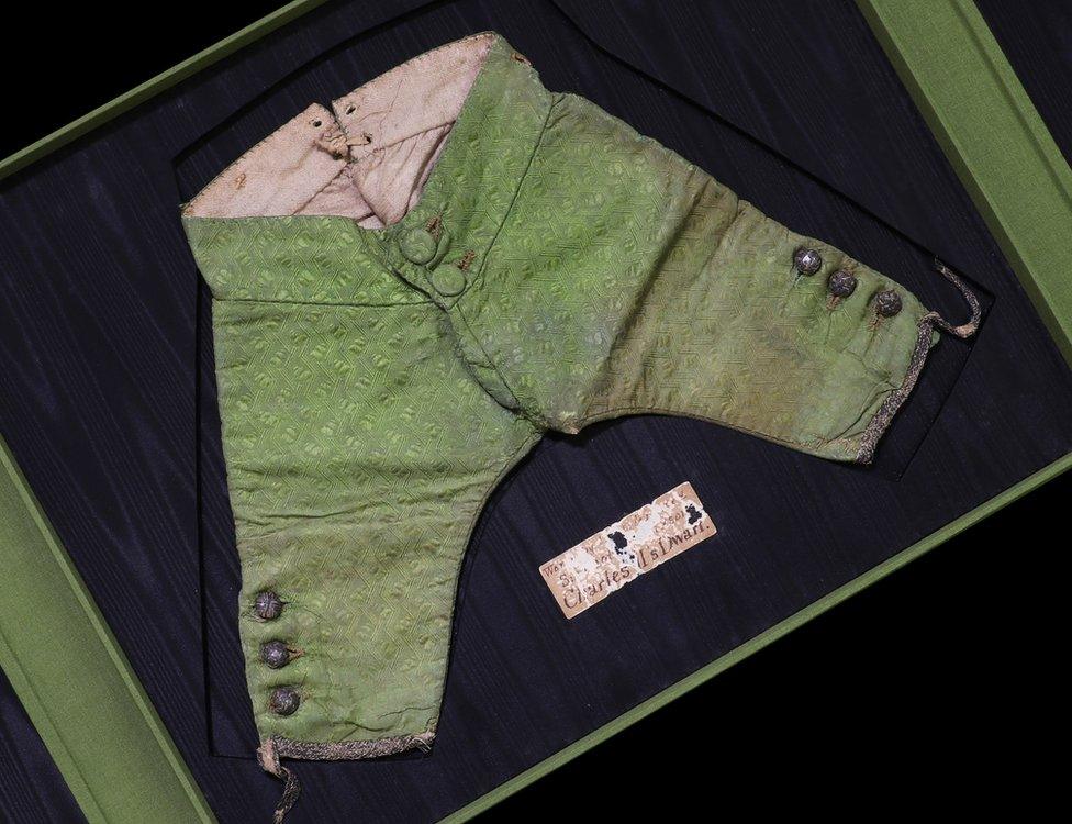 A pair of green silk brocaded trousers thought to have been worn by the 17th century court dwarf Sir Jeffrey Hudson sold for £9,570 at auction