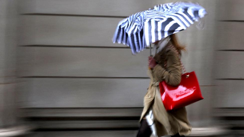 A pedestrian walks past the Bank of England in central London on 27 September 2022