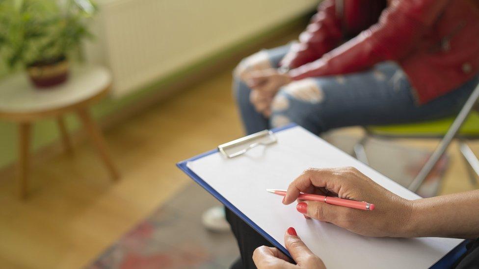 Stock image of a patient in a therapy session