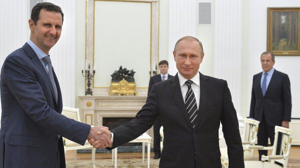 Syrian President Bashar al-Assad shakes hands with Russian President Vladimir Putin at the Kremlin in Moscow, Russia (20 October 2015)