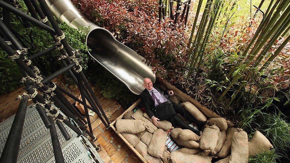 Man-at-the-bottom-of-a-slide.