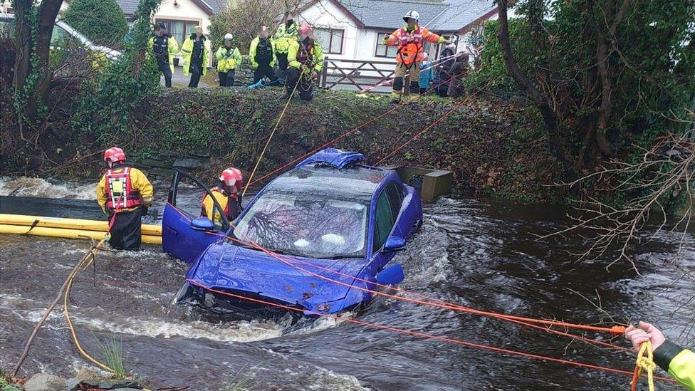 car in river