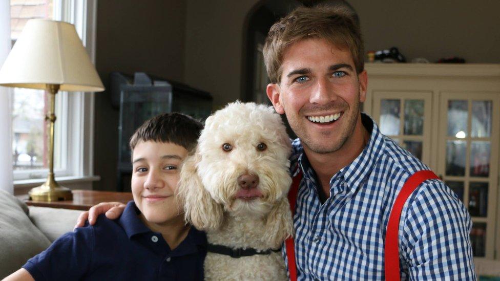 Chris with Owen and a dog