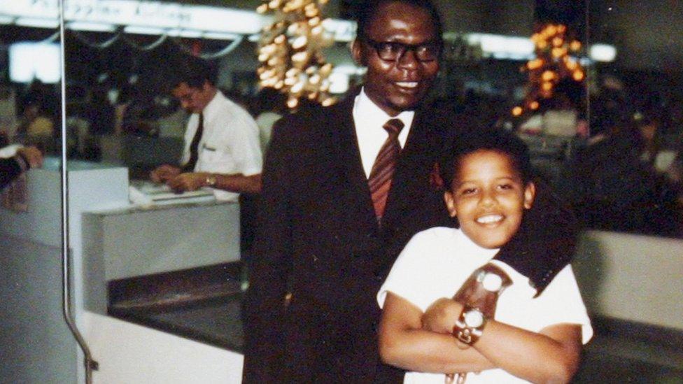 Barack Obama, as a child, pictured with his father, Barack Obama Sr, in the 1960s