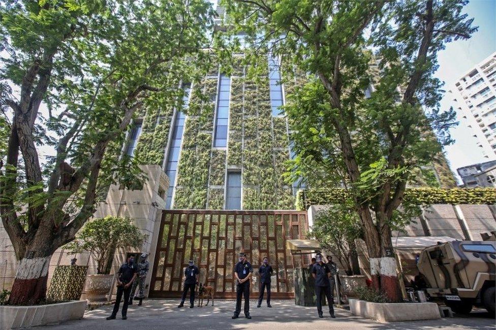 Security personnel stands guard outside Antilia, a multi-storey residence building of Indian industrialist Mukesh Ambani, in Mumbai, India, 26 February 2021