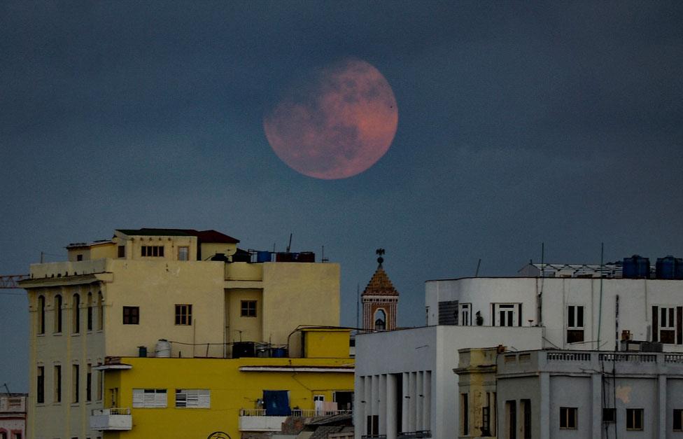 The pink supermoon seen above Havana in Cuba