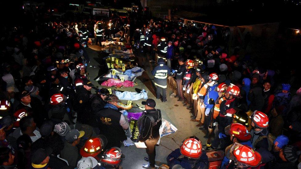 Emergency services attend to bodies on the road following the hit and run